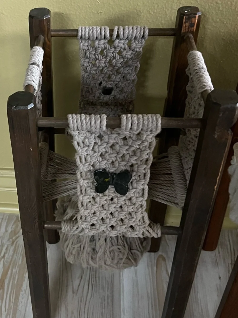 Vintage Handmade wooden and macrame plant stands featuring a woven owl pattern